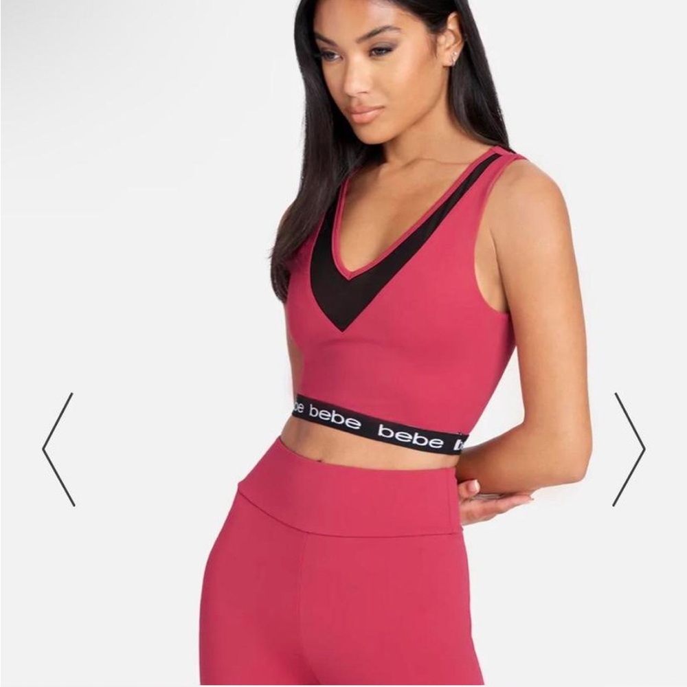 BEBE Logo Elastic Mesh Insert Top cropped workout top with mesh insert